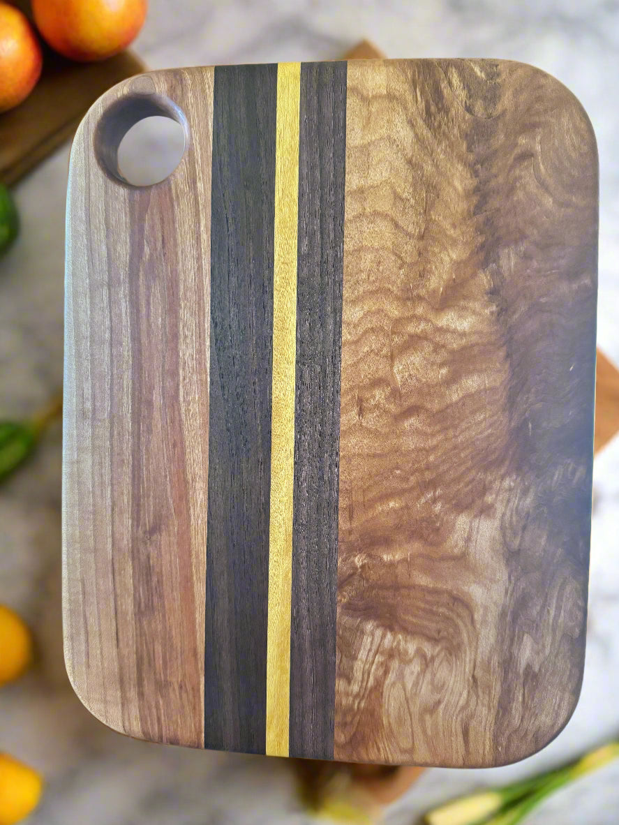 Maple, Walnut, Cherry and Yellow heart Cutting Board