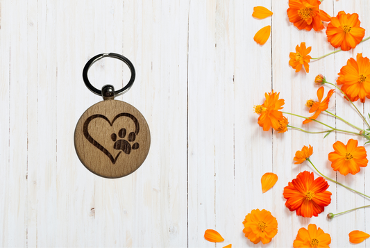 Wooden keychain with heart and paw print design 