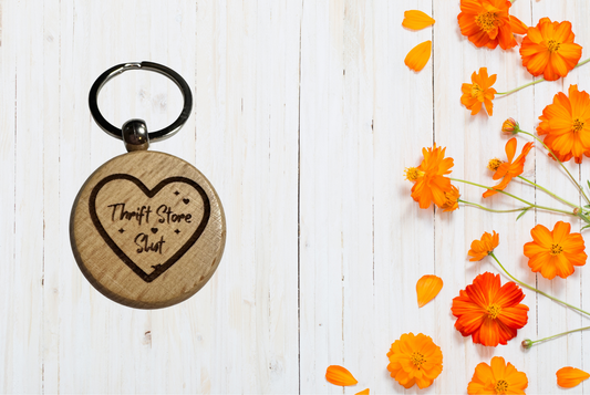 Wooden heart-shaped keychain with 'Thrift Store Slut' engraving 
