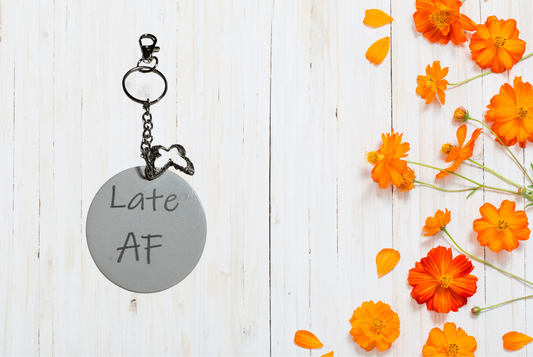 Keychain with 'Late AF' tag 