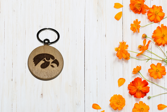 Wood keychain with humorous text 