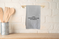 Kitchen towel with humorous text 