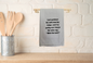 Kitchen towel with humorous text 