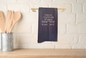 Kitchen towel with humorous text
